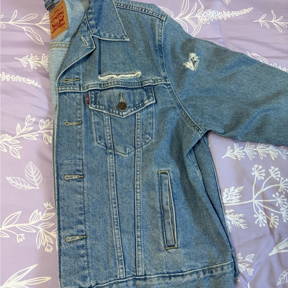 Levi's Light Blue Distressed Denim Trucker Jacket